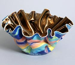 gold and multi-colored bowls